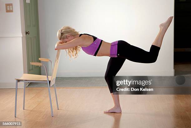   Tracey Mallett demonstrates the Booty lifter . Lift leg, toes pointed to ceiling in a two count. Position one. PHOTOGRAPHED TUESDAY FEBRUARY 28,...