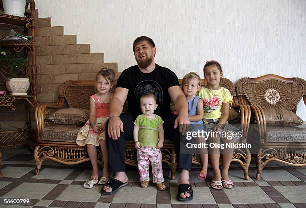 Chechen First Deputy Prime Minister Ramzan Kadyrov poses with his family in Gudermes, 2 August 2005, Chechnya, Russia. Chechen acting premier Ramzan...