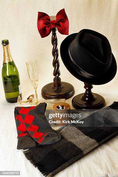 Holiday dressing that onclude several, fun items that when added to an ensemble make for a festive holiday look: Paul Smith socks $ and cufflinks,...