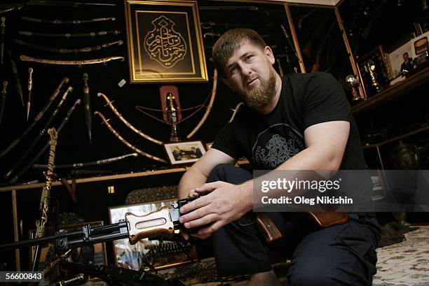 Chechen First Deputy Prime Minister Ramzan Kadyrov shows his extensive collection of weapons in his office in Gudermes, 2 August 2005, Chechnya,...