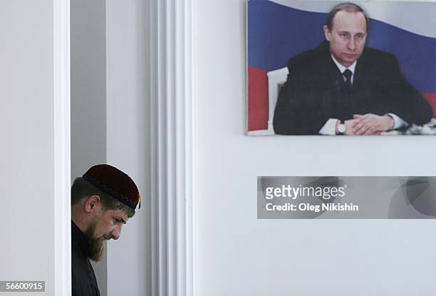 Chechen First Deputy Prime Minister Ramzan Kadyrov shows his extensive collection of weapons in his office in Gudermes, 2 August 2005, Chechnya,...