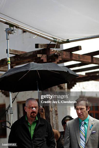 Actors Bryan Cranston, playing Walter and Bob Odenkirk, as his lawyer Saul Goodman, prepare for a scene on location in Albuquerque, NM, for filming...
