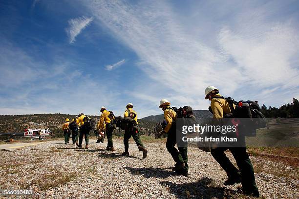 Kern Valley Hotshots board a helicopter at Chuchupate Ranger Station in Los Padres National Forest, to be dropped high on top of mountains to fight...