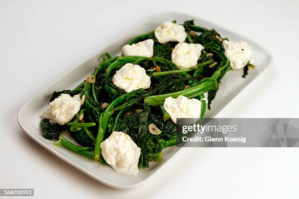 Broccoli Rabe with Burrata, was Photographed at the Los Angeles Times via Getty Images photo studio on June 18, 2013. For a Calcook on entertaining...