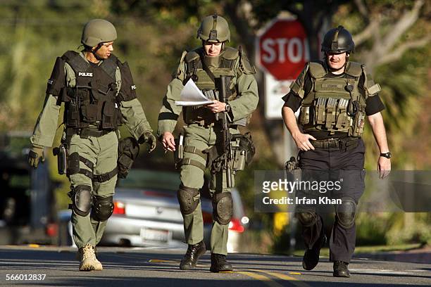 February 11 , 2010 ; Whittier police SWAT surrounded the home seeking a possible suspect where a woman was fatally shot today at a residence in...