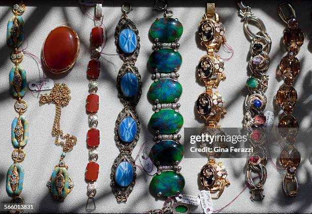 Vintage jewelry from left to right: 1)bracelet and pendant set -- turquoise art glass rings, gilded and enameled brass, seed pearls; Czechoslovakia...