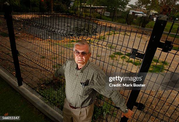 John Harris, Ph.D., Chief Curator of the Page Museum at the La Brea Tar Pits stands near the area where expansion plans being proposed by next door...