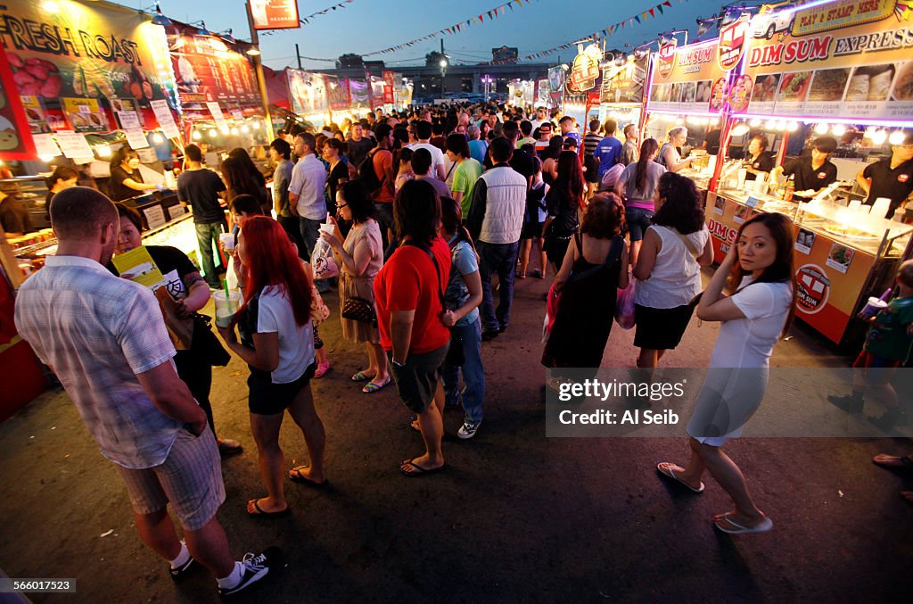 Crowds pack the sprawling Asian night Market in Richmond on a Sunday night  that locals and visitor