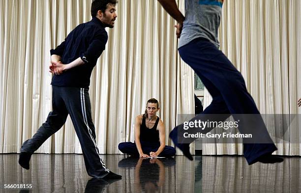 Lillian Barbeito , co-director of BodyTraffic, takes notes on "o2Joy" dancers Guzman Rosado and Miguel Perez at the Loyola Marymount University Dance...