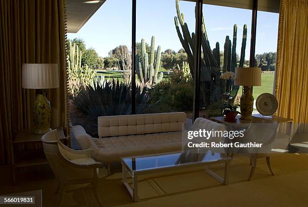 Bright yellow carpet and custom furniture are featured in the master suite at the Annenberg estate.