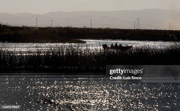 Boaters navigate the MIddle River between Bacon Island and Lower Jones Tract in the Sacramento River Delta near Stockton, Calif. Levees in the area...