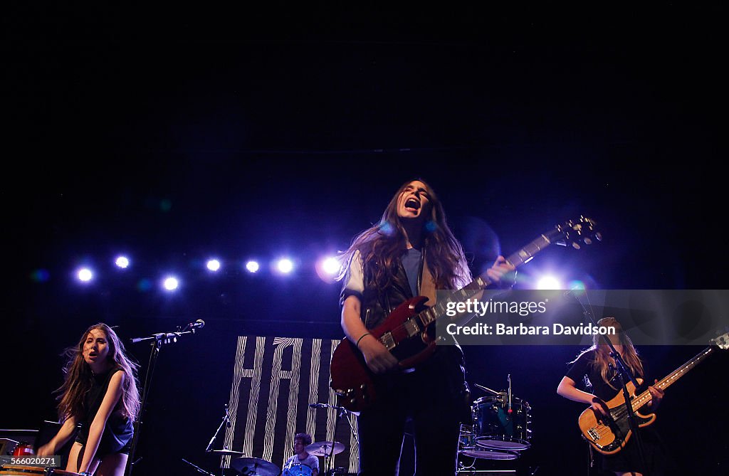 LA band Haim, a sister-fronted trio, (L-R)  Alana, Danielle, Este Haim, and drummer Dash Hutton, wh