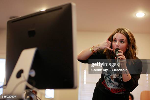 Recording artist JoJo performed inside a friend's Los Angeles home, in front of an iMac computer, for a live broadcast on StageIt.com, February 28,...
