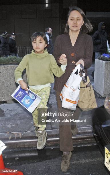 Woody Allen's wife Soon-Yi Previn is seen as she leaves Madison Square Garden with her daughter after watching the New York Knicks lose to the...