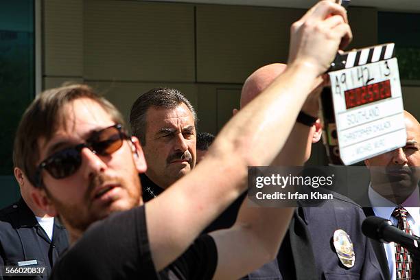 Film crew shoots a scene from last episode of Southland in which LAPD Chief Charlie Beck is seen addressing a press conference in front of Parker...