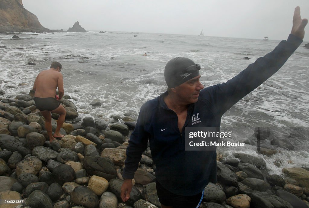 RANCHO PALOS VERDES, CA., OCTOBER 4, 2010; (right)Distance swimmer David Hartmire waves to family a