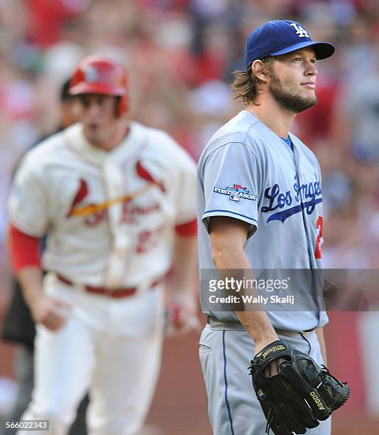 Dodgers Clayton Kershaw looks towards the scoreboard as Cardinals David Reese scores a run on the 5th innng in game 2 of the NLCS in St. Louis...