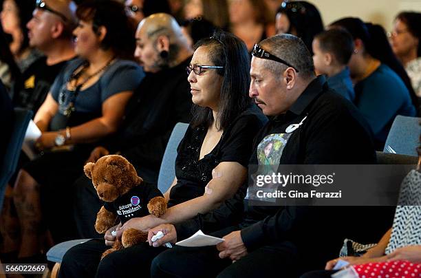 Grandparents Sandra and Robert Fernandez attend the memorial service for their grandson Gabriel Fernandez at Church of the Foothills on June 12, 2013...