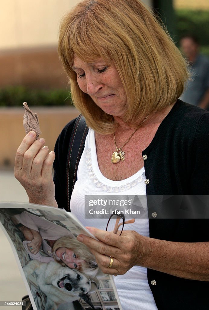 During a press conference held in Riverside on September 02, 2008, Mary Michael (Cq) holds back her