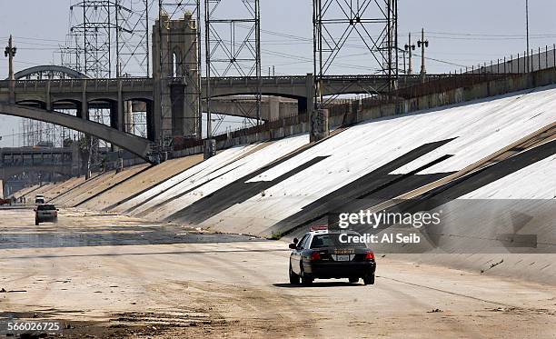 Los Angeles County Sheriffs Alberto Zambrano and Devin Vanderlaan drive by the graffiti known as "MTA" which is the tagging crew name for metro...