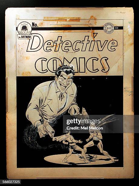 Copy photo of the cover of Detective Comics issue @@#69 by artist Jerry Robinson, depicting The Joker and the Dynamic Duo, Batman and Robin the Boy...