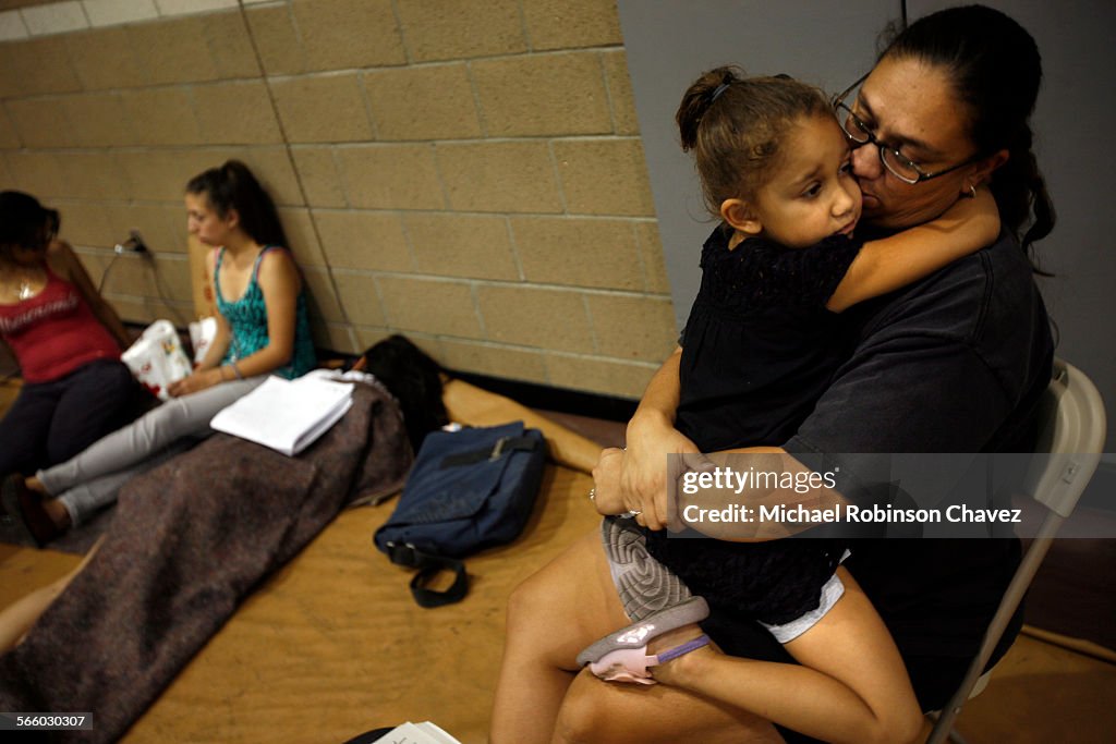 GRANADA HILLS, CA November 15, 2008 Katrina Vieane(cq) hugs her 4yearold daughter Briana Burgeno