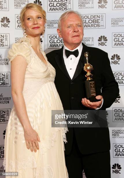 Actress/presenter Gwyneth Paltrow and actor Sir Anthony Hopkins, with his Cecil B. DeMille Award, pose backstage during 63rd Annual Golden Globe...