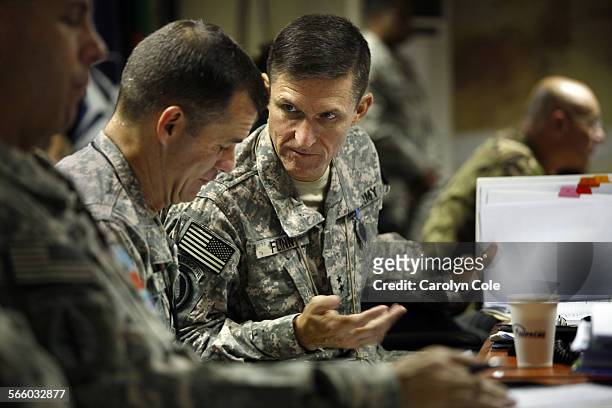 Maj. General Michael T. Flynn, right, is director of intelligence in Afghanistan. Flynn's brother, Col. Charlie Flynn, left, is aide to General...