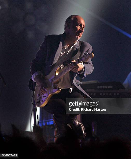The Who's Pete Townsend gets some air as he leaps on the stage during the VH1 Honors tribute to the Who at Pauley Pavilion on the UCLA campus in...