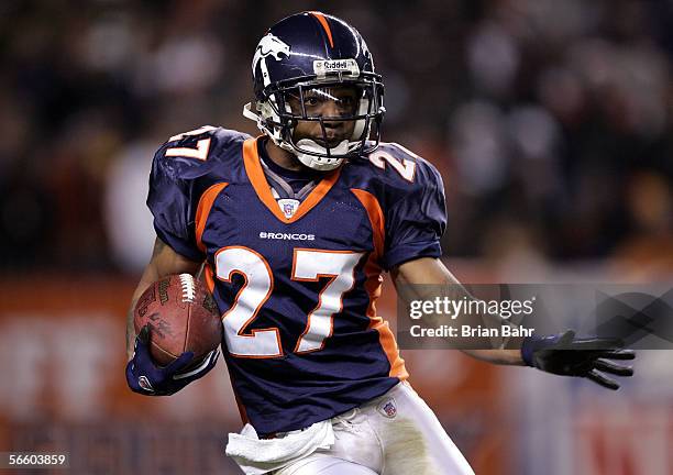 Cornerback Darrent Williams of the Denver Broncos runs with the ball during the AFC Divisional Playoff game against the New England Patriots on...