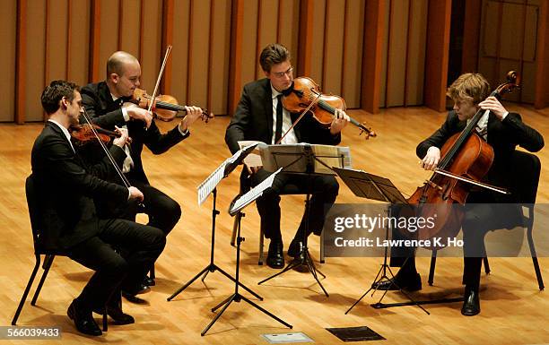 Calder String Quartet Ben Jacobsonviolin, Andrew Bulbrookviolin, Jonathan Moerschelviola and Eric Byerscello performing Mozart's String Quartet...