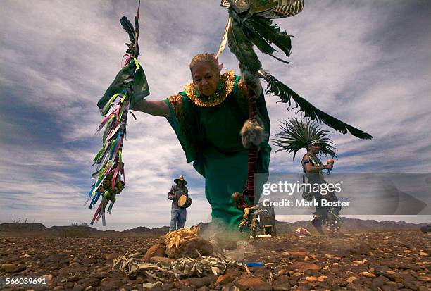 Estrella Newman from Mexico City , drummer Jesus Figuera and Aztec dancer Netze Cauhtemoc perform a sacred dance around burning sage during a ritual...