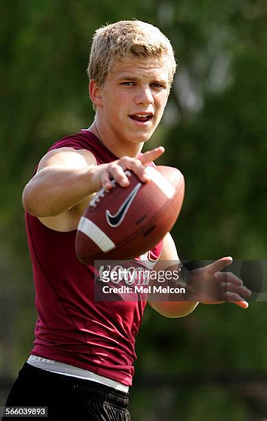 Nicholas Montana a quarterback who transferred to Oaks Christian H.S. From De la Salle H.S. , warms up with teammates before start of a passing...