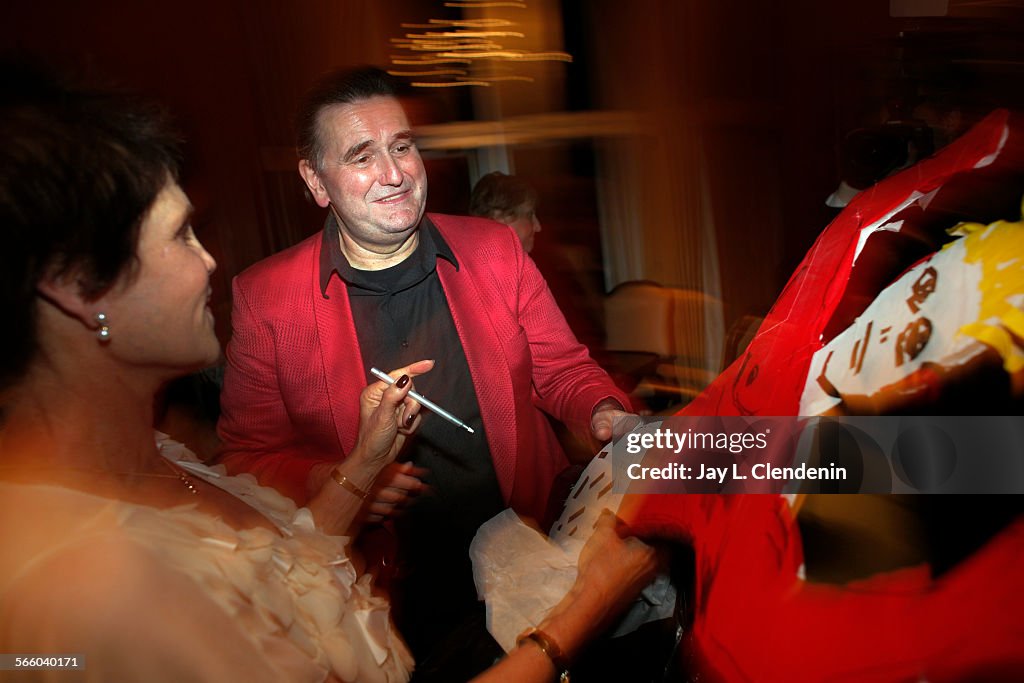 Following the closing of Gotterdammerung, Diane Gray gets an autograph from tenor John Treleaven, w