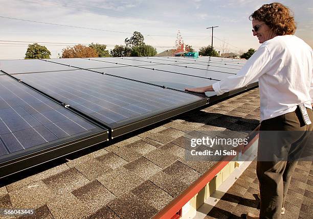 Michelle Hack Solar Graphics 260 Michelle Workmen Stock Photos, High-Res Pictures, and Images ...