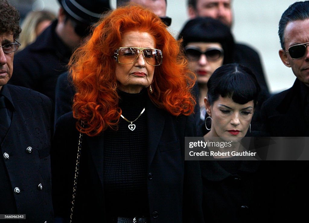 (Los Angeles, Ca. - Tuesday, December 16, 2008) Graveside at the Bettie Page funeral are Tempest St