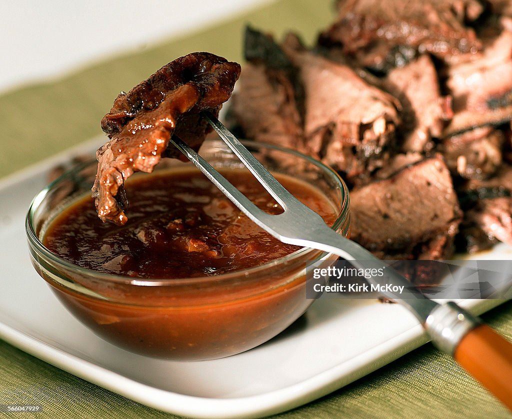 Texas hickory smoked brisket with coffee barbecue sauce.