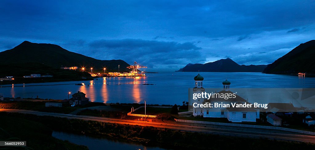 The twin domes of the Russian Orthodox Church in an early morning view from Unalaska on Unalaska Is