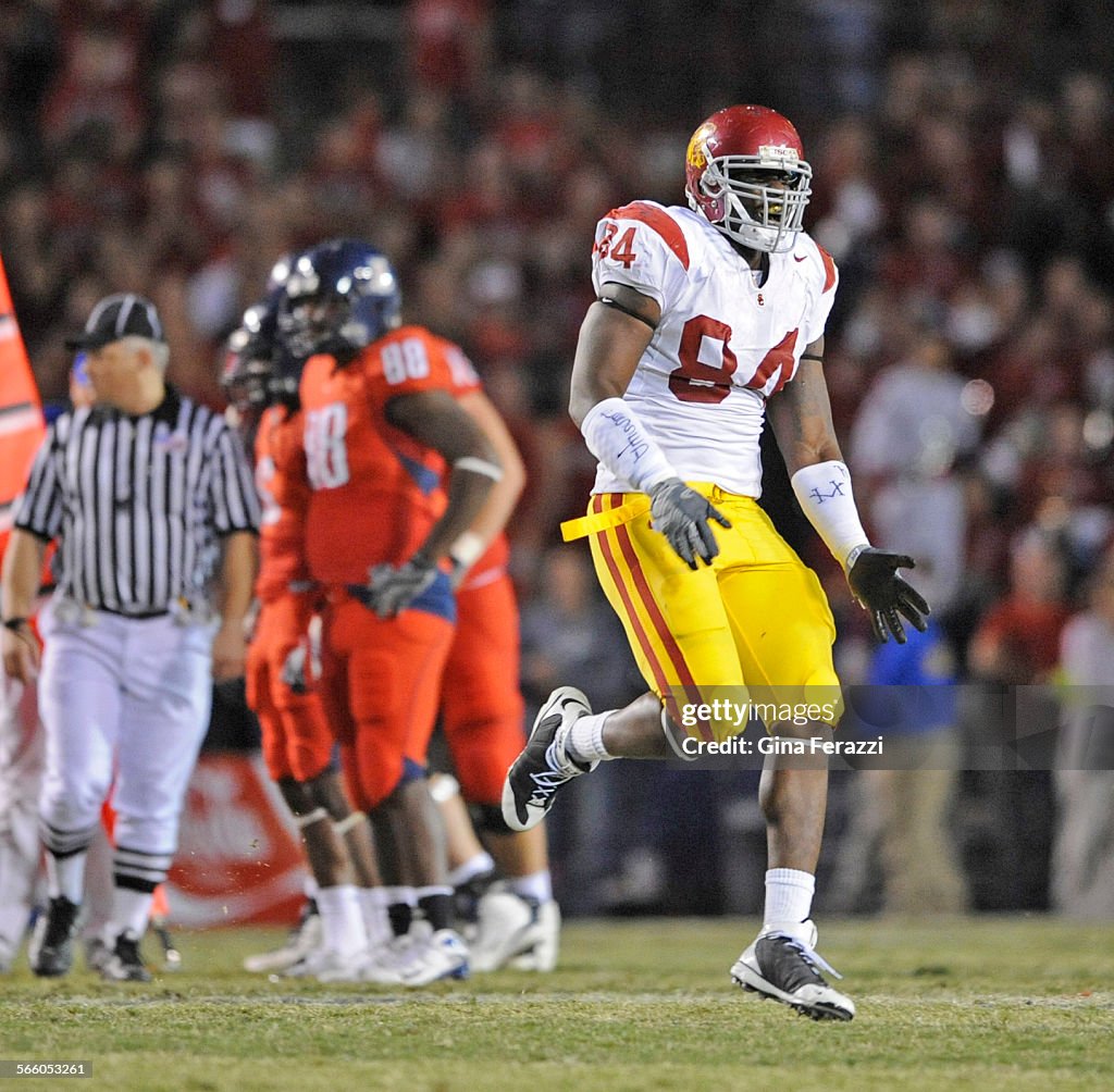 USC defensive end Kyle Moore reacts after stopping Arizona on a 4th down play at the University of
