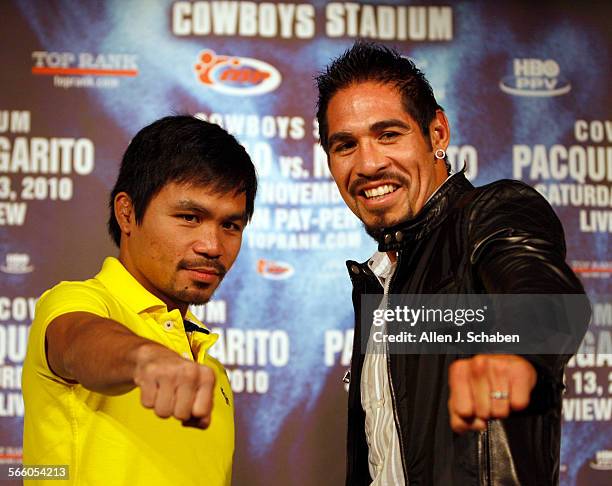 Tentime world champion Congressman Manny "PacMan" Pacquiao, left, poses with Antonio "The Tijuana Tornado" Margarito, who will fight for the World...