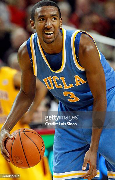 Feature photo of UCLA point guard Malcolm Lee.
