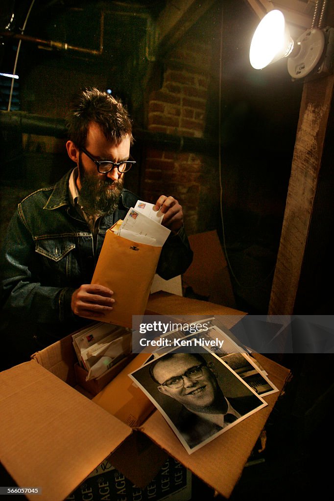 Mark Everett standing under his house where he stores his fathers memoirs in boxes, pictured is his