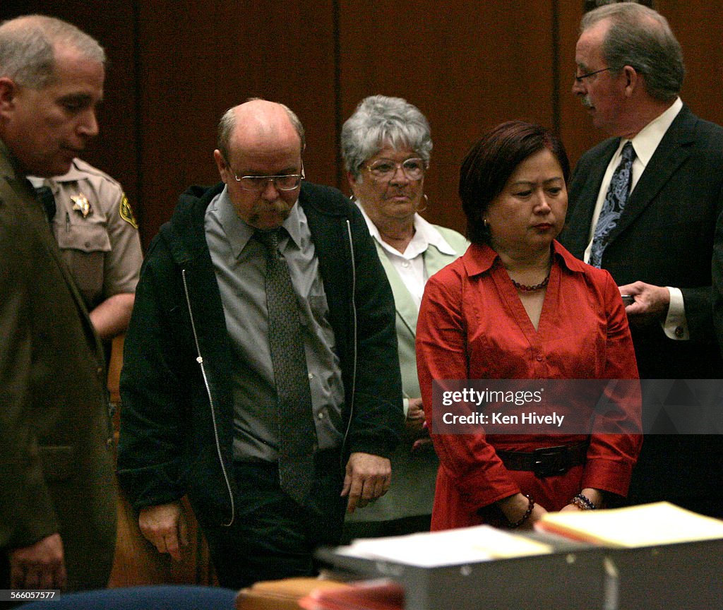L-r are attorney John Powers, Scott Carwile, Cathe Wilson Judy Wong and attorney Robert Wilson. Tem