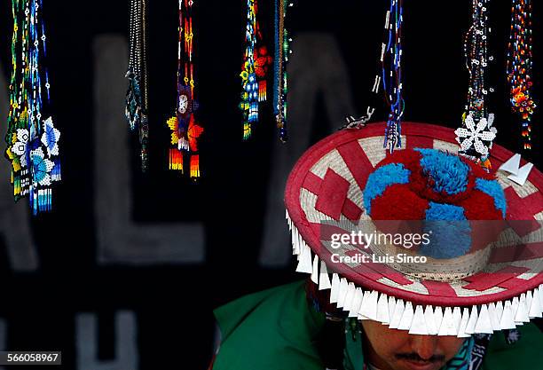 Eagle Rabbit sets up a booth featuring Huichol Indian literature and beadwork during Sunday's, Jan. 24 Anarchist Book Fair at Barnsdall Park in Los...