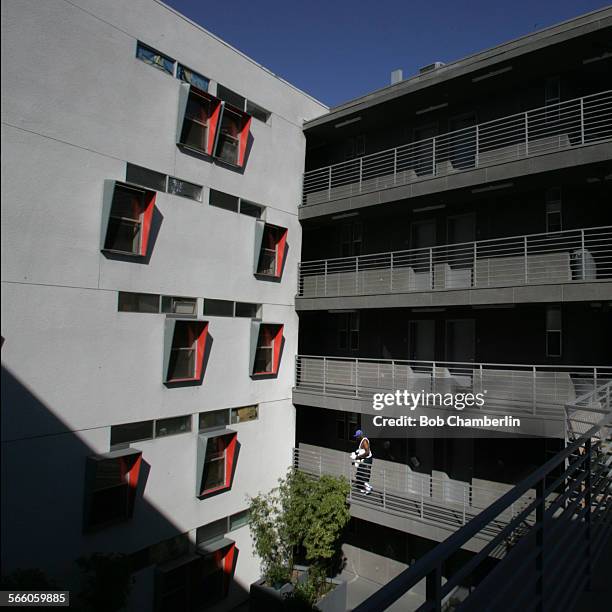 Resident of the "Rainbow" apartment building walks to his room in the building on Skid Row. The "Rainbow" and "Abby" are new apartments for the...