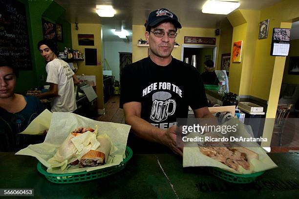 Owner Dave Evans putting up orders of Pilgrim sandwiches at Dave's Chillin & Grillin, in Eagle Rock, November 12, 2009. Every Thursday, the Boston...
