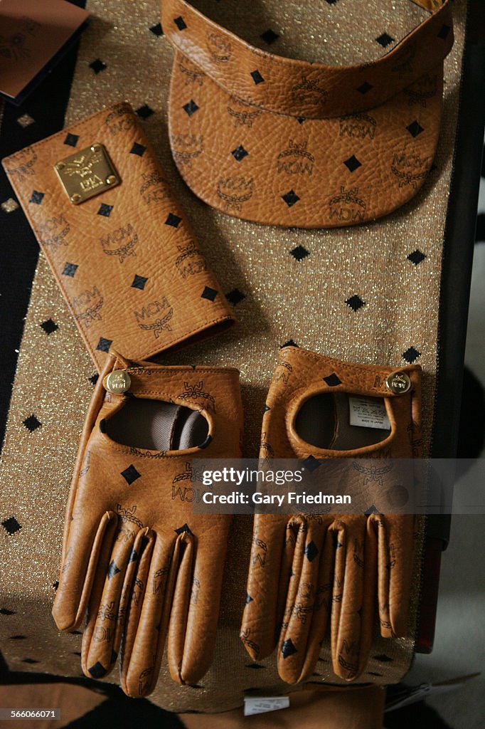 Leather gloves/hat/wallet by Taz Arnold, an L.A. based style setter/music producer that has been pa
