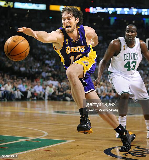 Boston, MassachusettesJune 17, 2008 Lakers Pau Gasol chaes a pass from Kobe Bryant as Celtics Kendrick Perkins looks on in Game 6 of the NBA Finals...