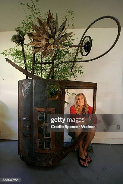 Laura Lynch, a Santa Barbara sculptor, created a 10-foot tall piece out of rubble from Santa Barbara Botanic Garden, which was heavily damaged in the...