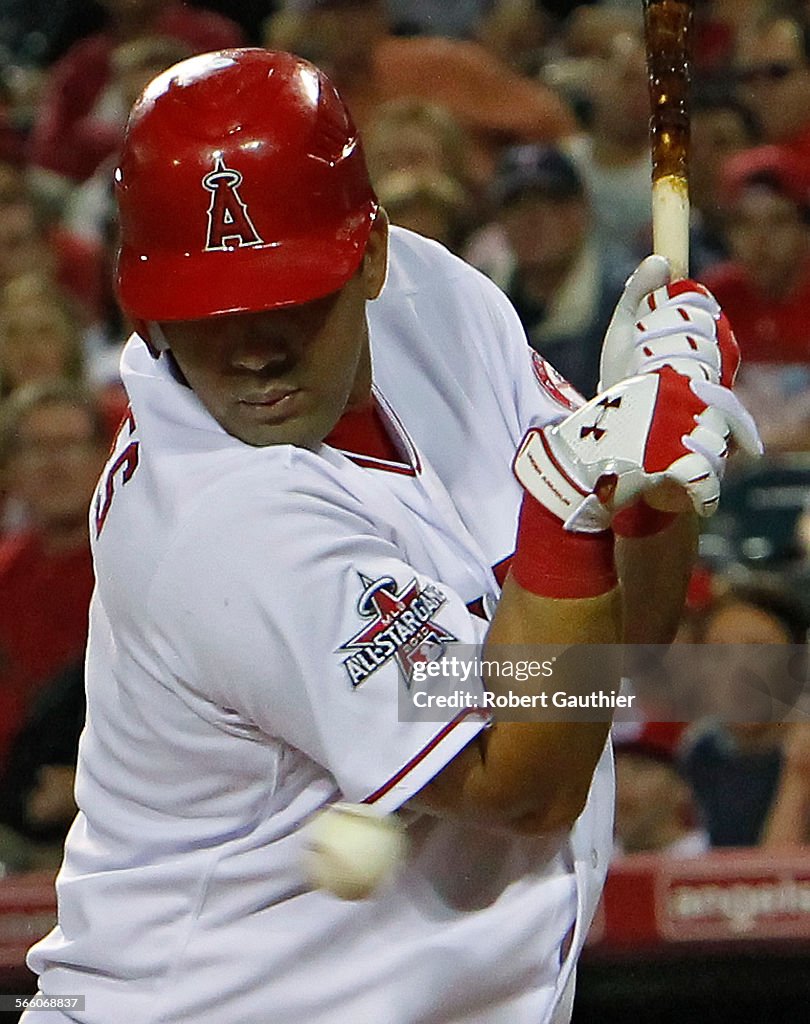 ANAHEIM, CA  APRIL 7, 2010 Angels first baseman Kendry Morales twists away from a close pitch from
